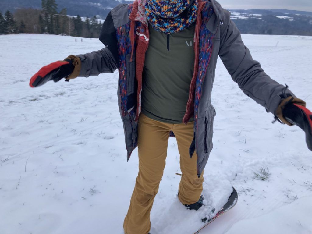 Muntagnard MIUtec Midlayer mit 1/2 Zip beim Snowboarden in den Bergen