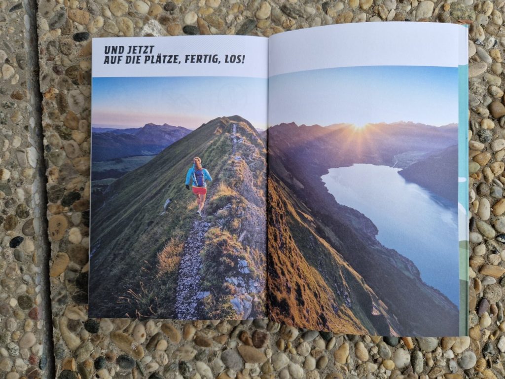 Läufer mit atemberaubendem Bergpanorama im Trail Running Schweiz Buch